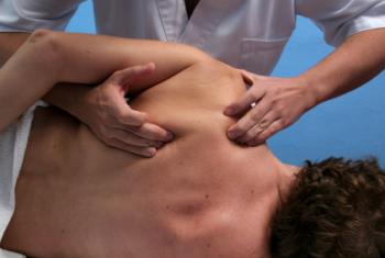 A Person Getting a Professional Manual Therapy